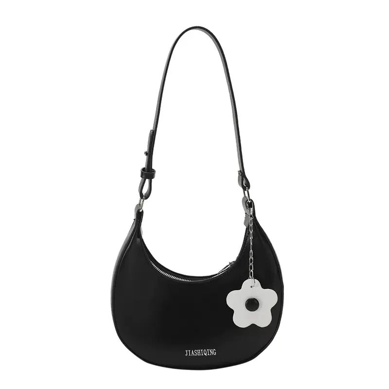 Mini shoulder bag with charm