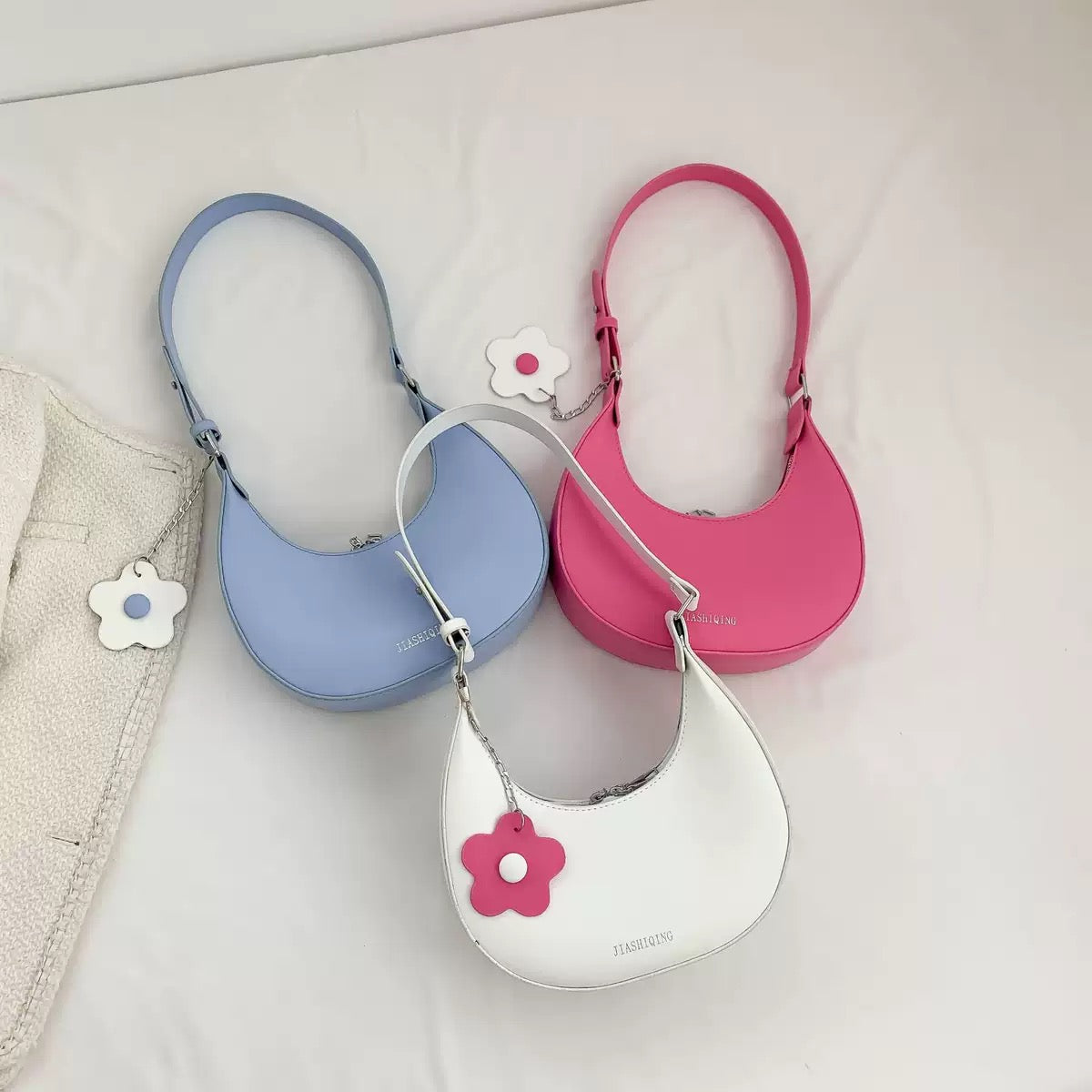 Mini shoulder bag with charm