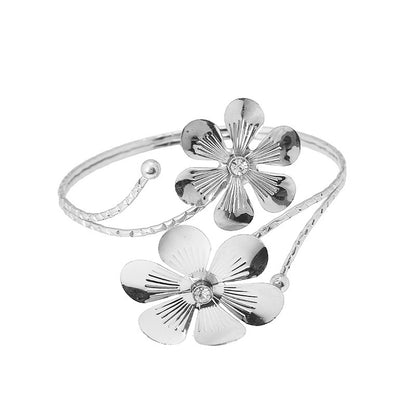 Butterfly and flower arm cuff