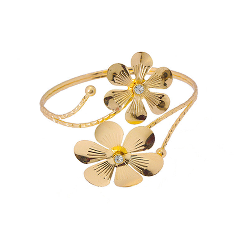 Butterfly and flower arm cuff