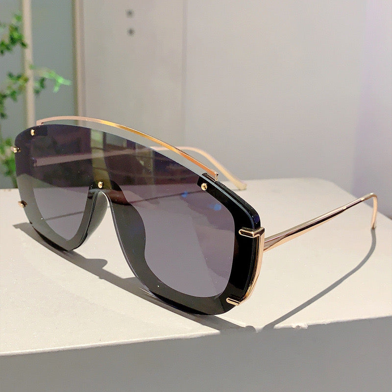Flat shield sunglasses with gold detail