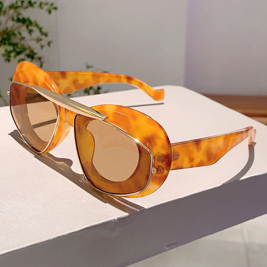 Bold round frame sunglasses with gold bar+ thick arms